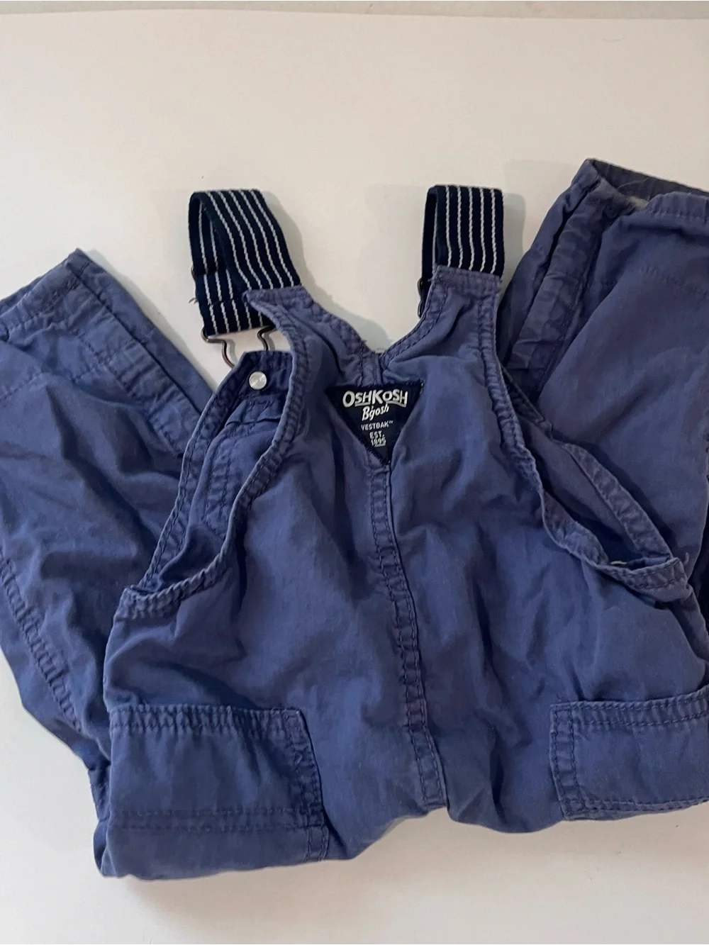 OshKosh B'gosh blue overalls with striped straps 18m